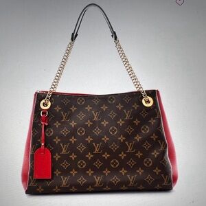 Louis Vuitton Surene Monogram Canvas w/Leather MM. Magnetic closure on top.